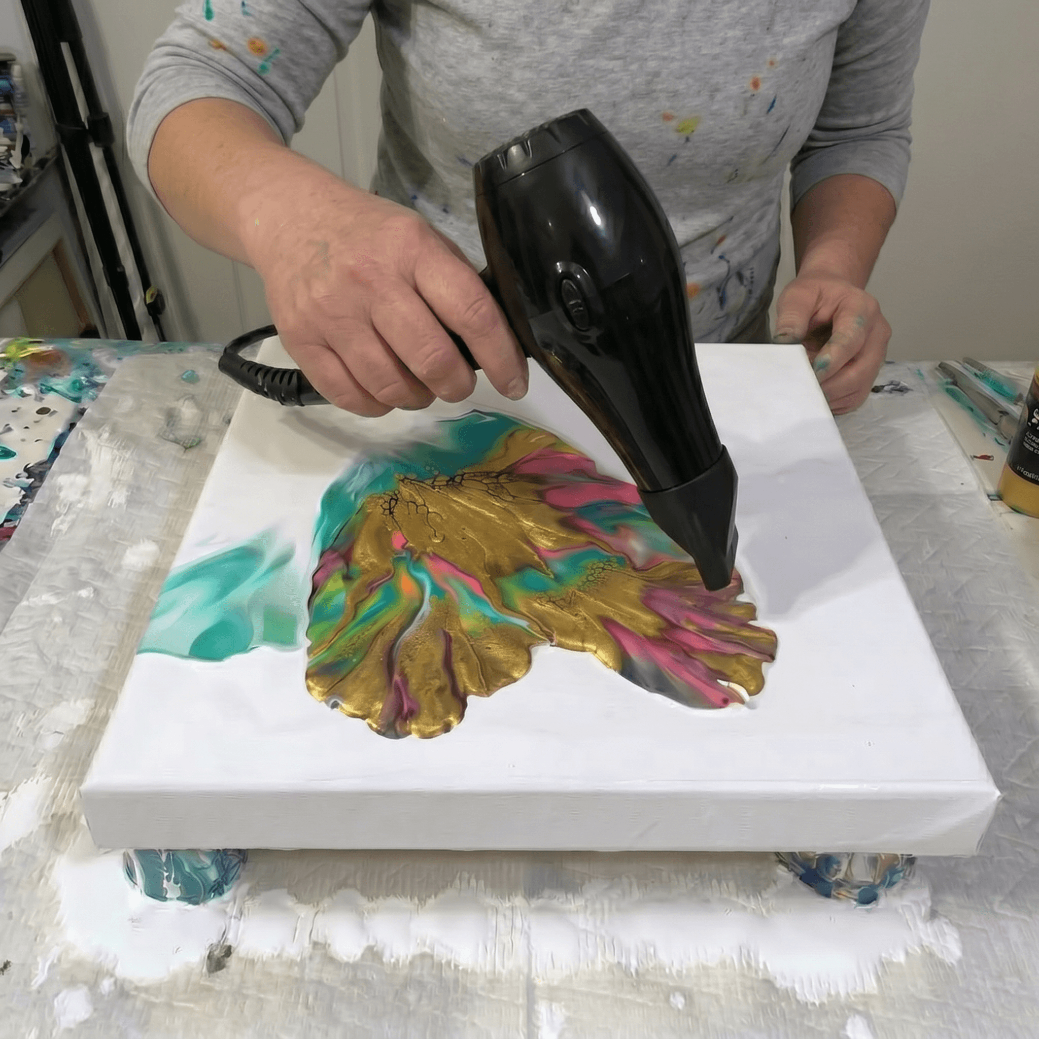 Module 3: first hairdryer pass beginning paint flow across wet canvas